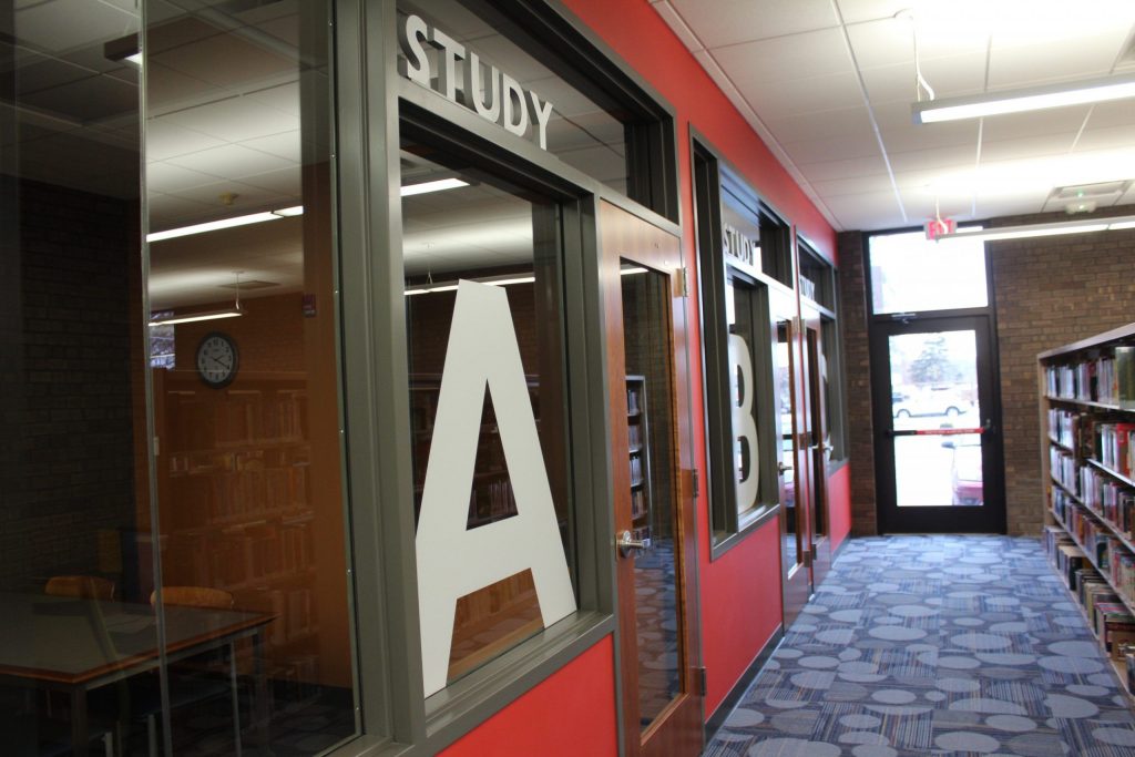 In front of Study Room A, looking towards exit at Reddick Library.