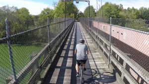 Biking over a Wooden Bridge in Ottawa, IL.
